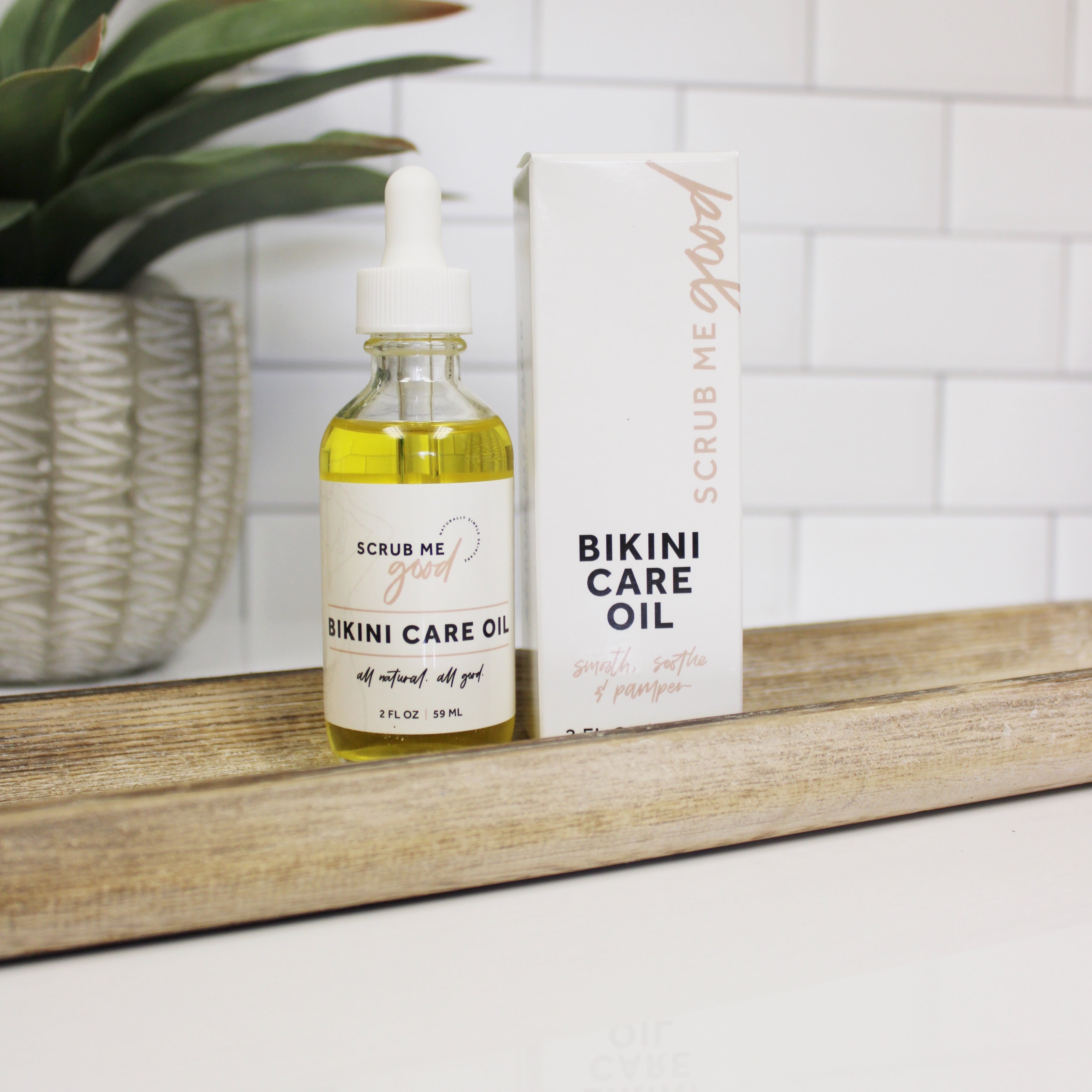 Fast-absorbing bikini oil for razor burn and irritation relief