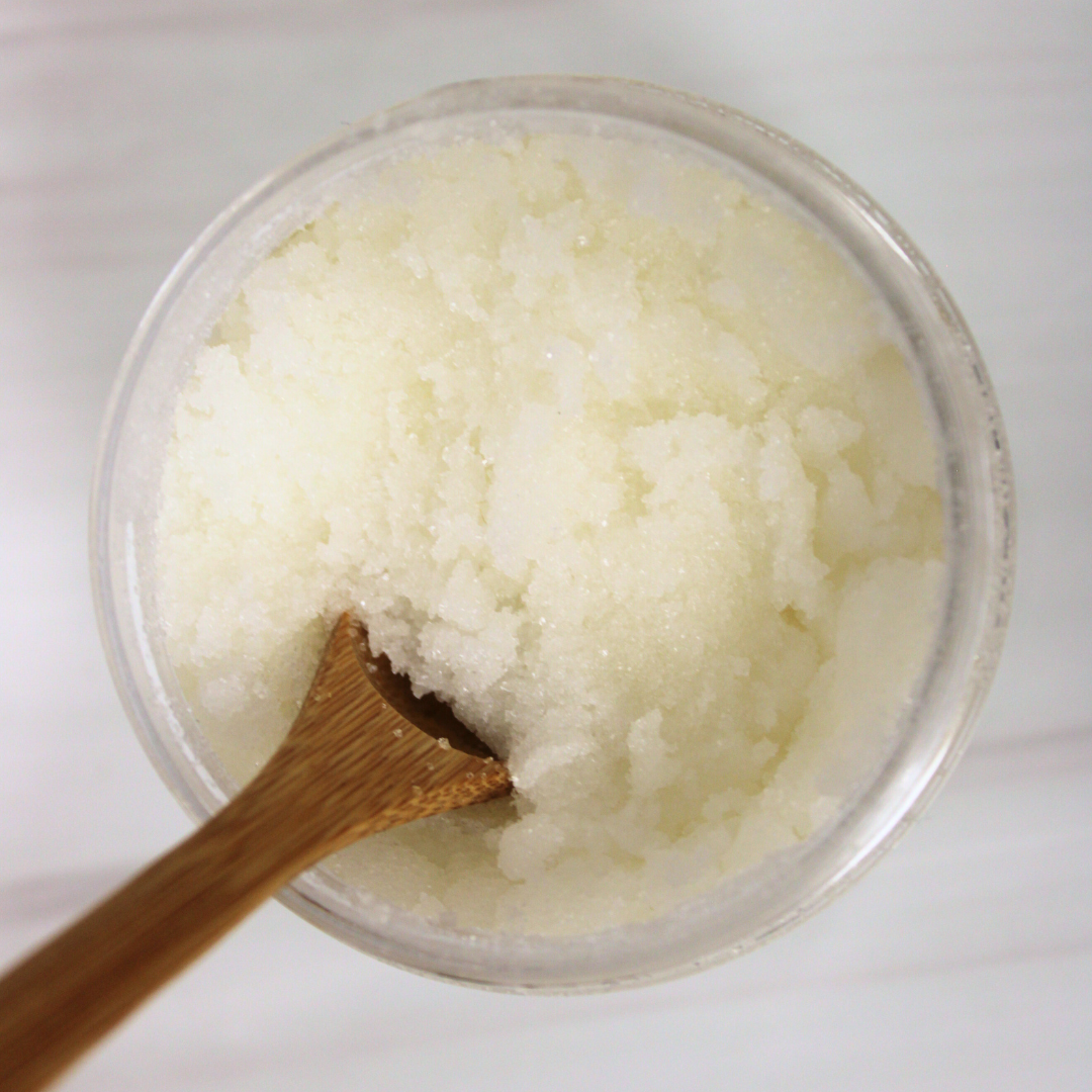 Close-up of Jasmine Vanilla Scrub texture with sugar crystals