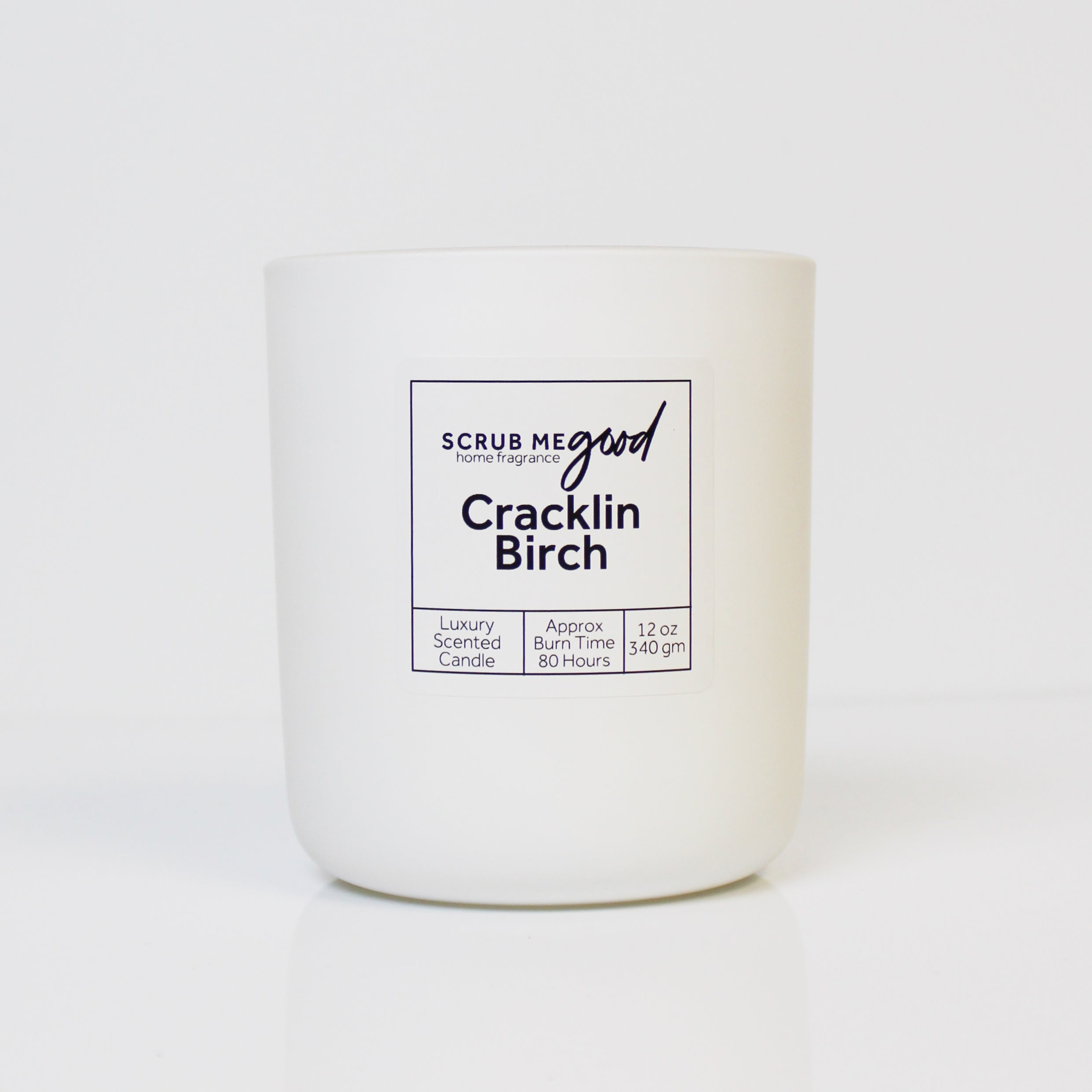 Scrub Me Good Cracklin Birch 12 oz wooden wick candle with fresh birch, cedarwood, and warm amber notes.