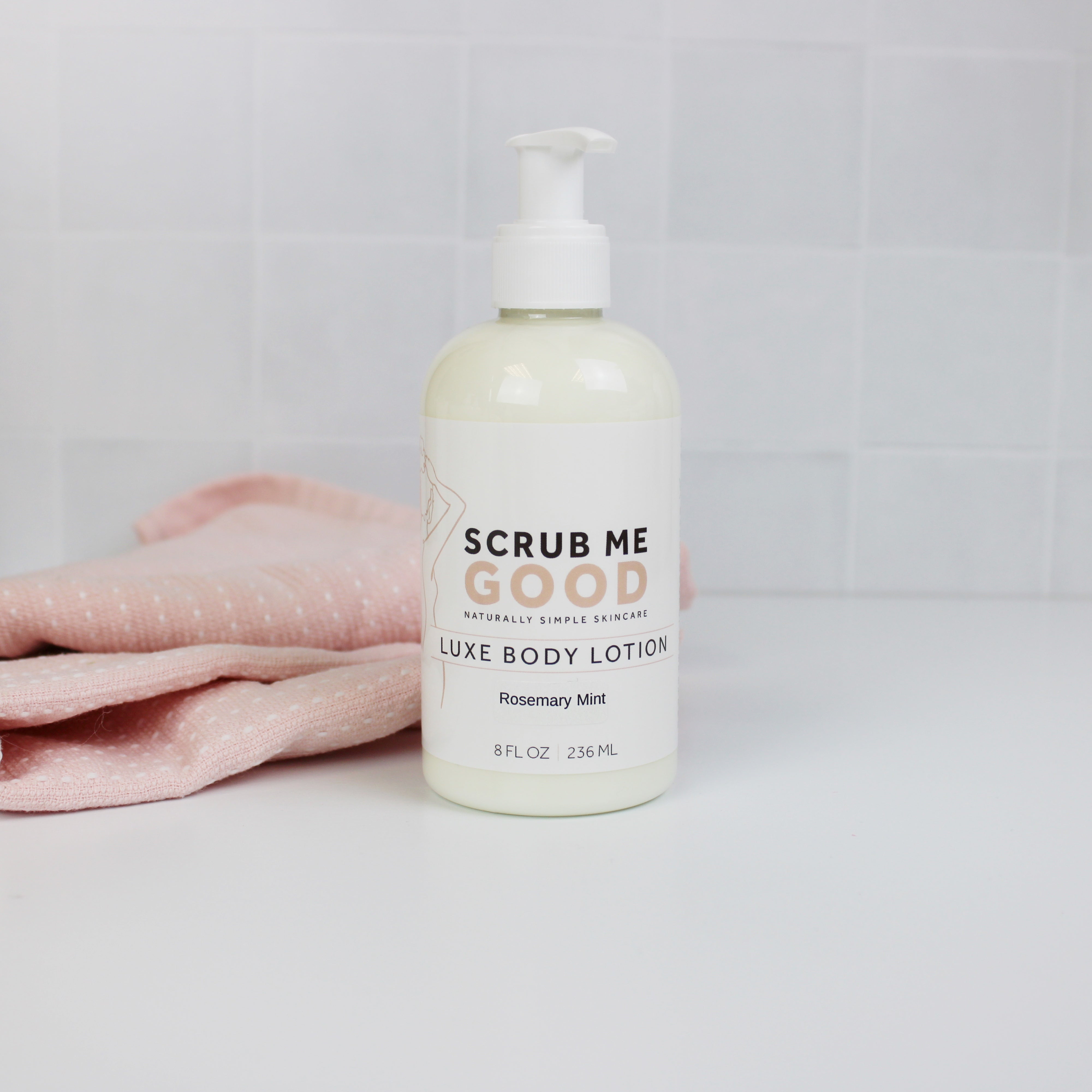 scrub me good rosemary mint luxe body lotion on white backround