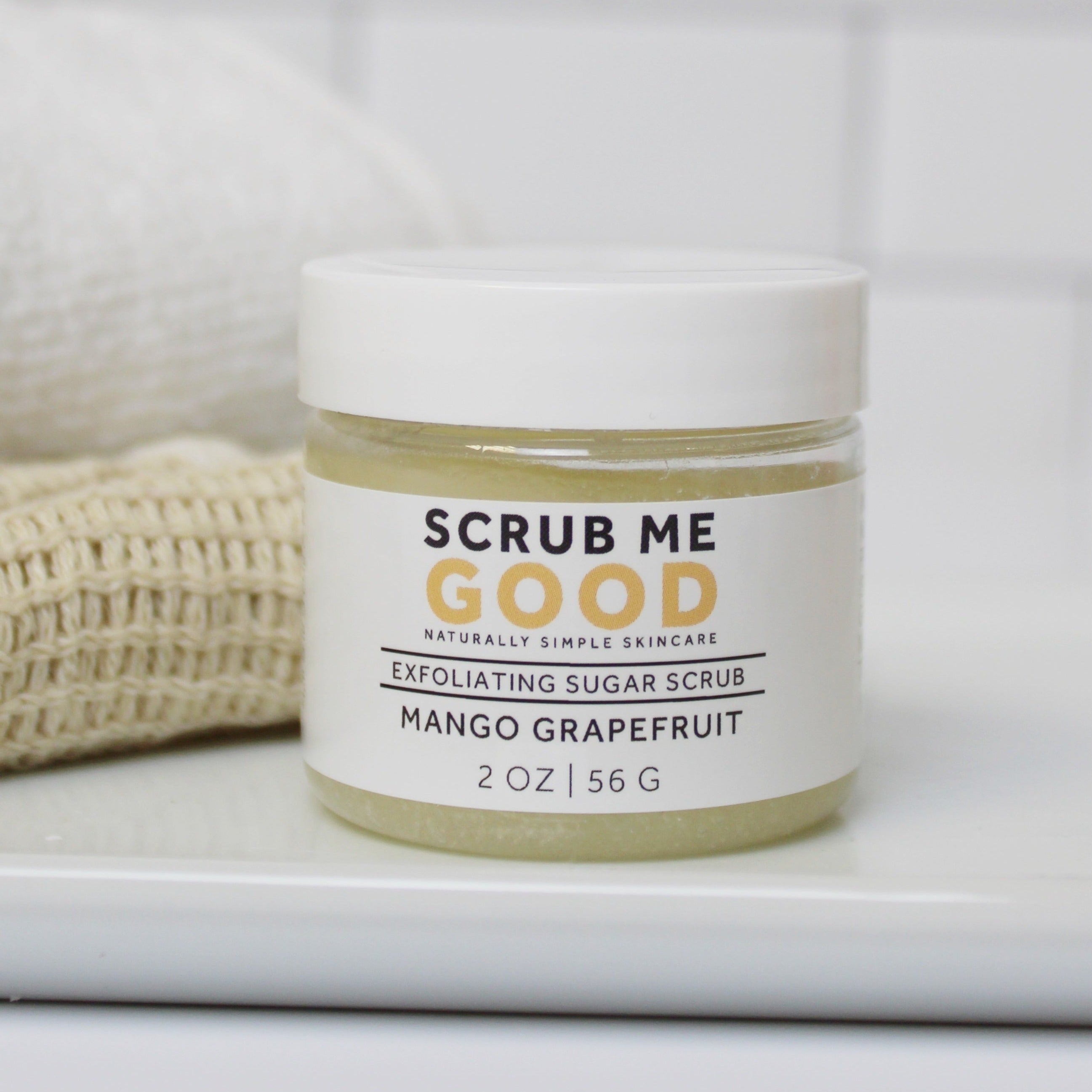 Juicy mango grapefruit body scrub for gentle exfoliation