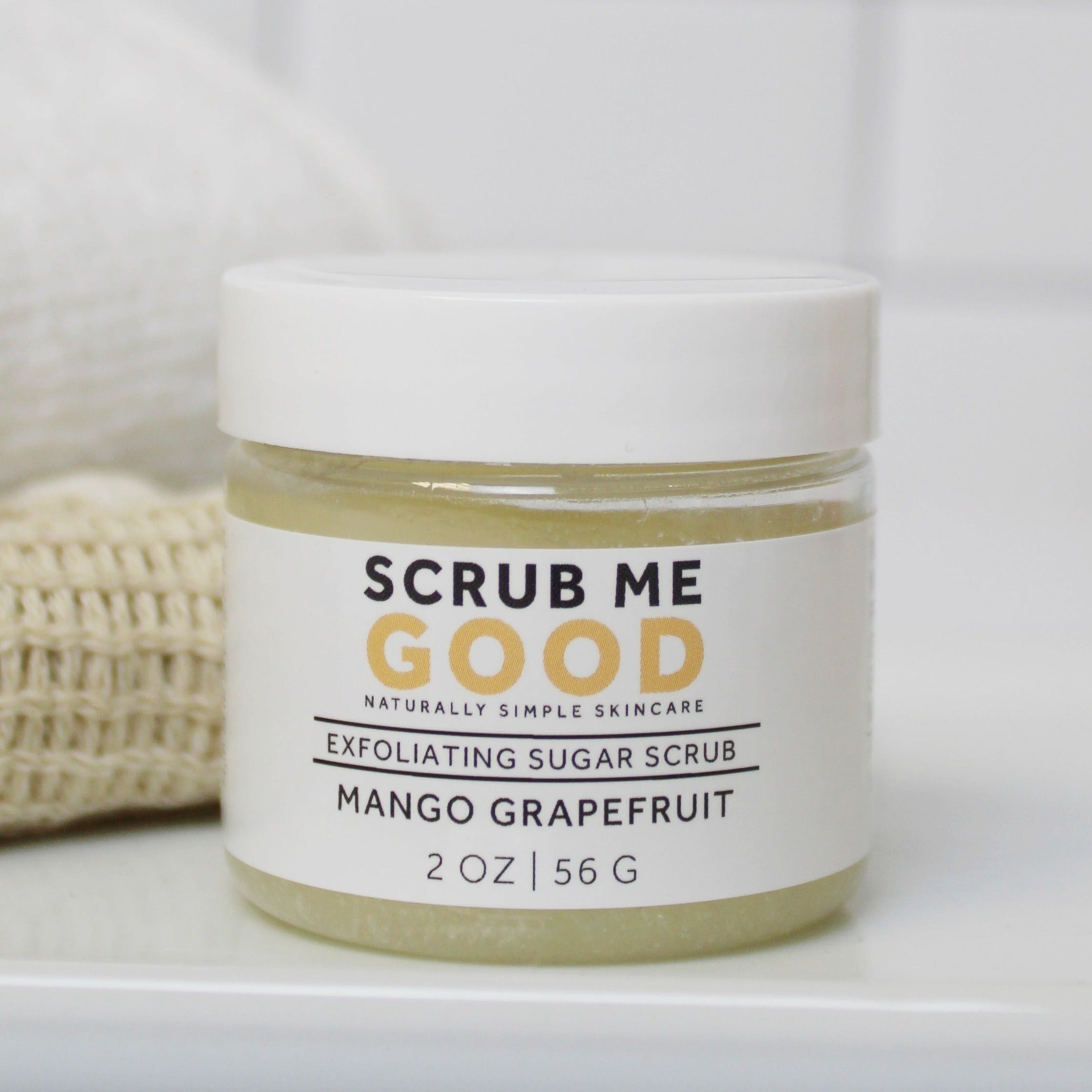 2 oz travel-size body scrub for dry skin Mango Grapefruit