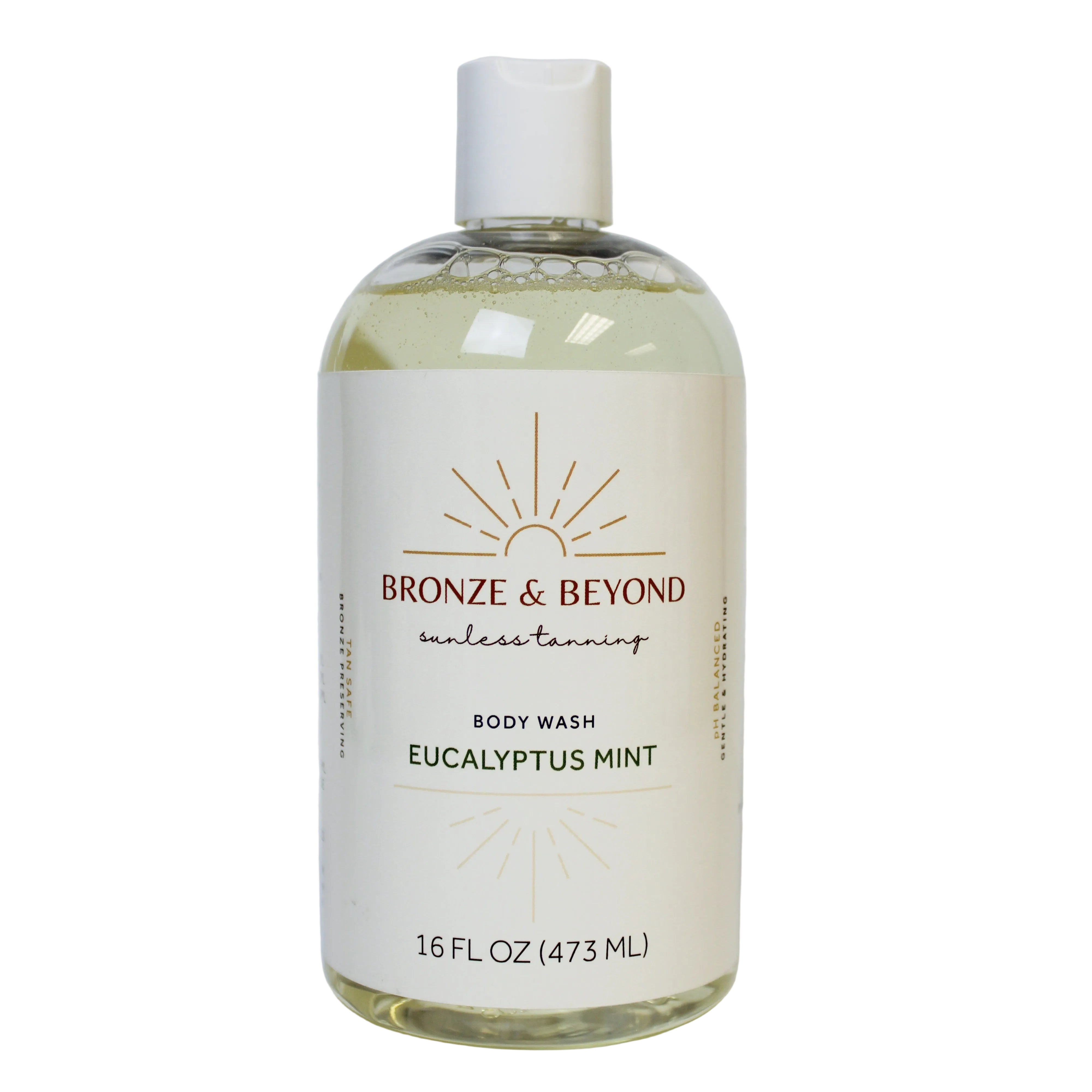 Bottle of Bronze & Beyond body wash with eucalyptus mint scent on a white background