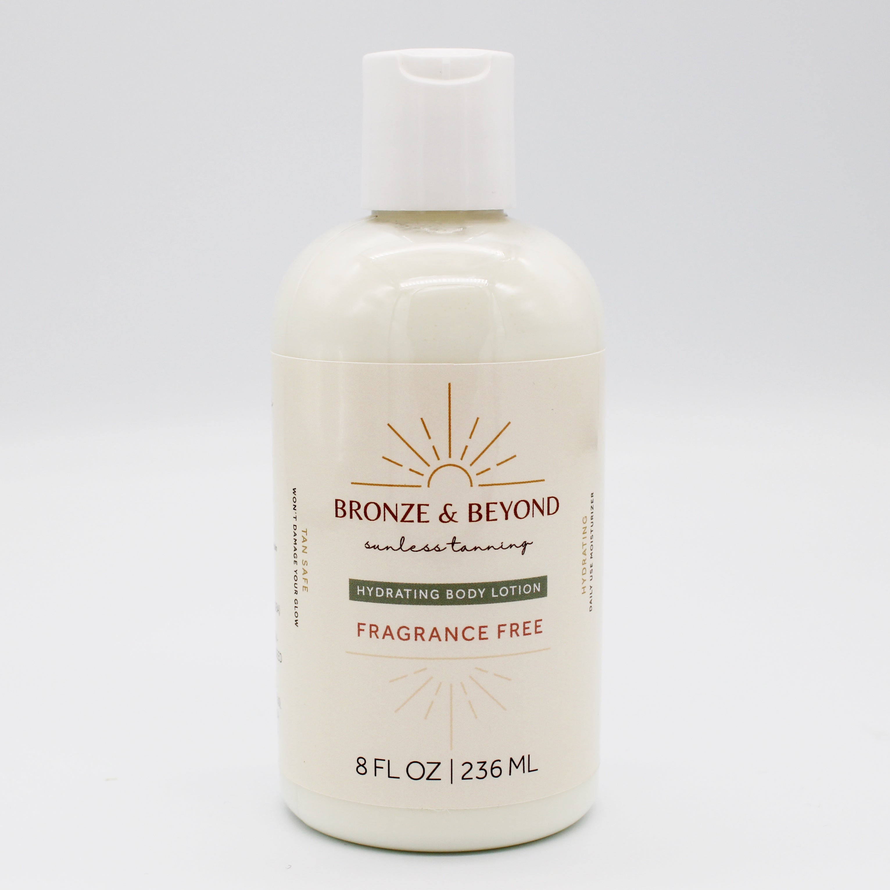 Bottle of Bronze & Beyond unscented tan safe body lotion on a white background