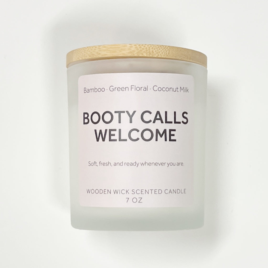 Booty Calls Welcome Scented Candle – 7 oz frosted glass jar with bamboo, green floral, and coconut milk fragrance