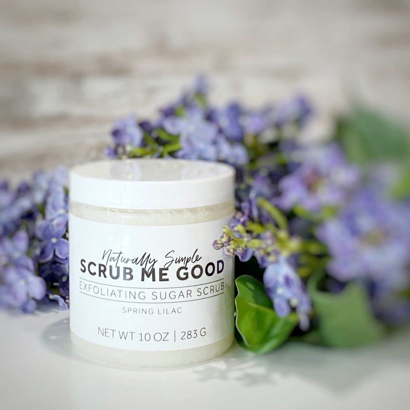Floral body scrub with natural lilac fragrance for dry skin