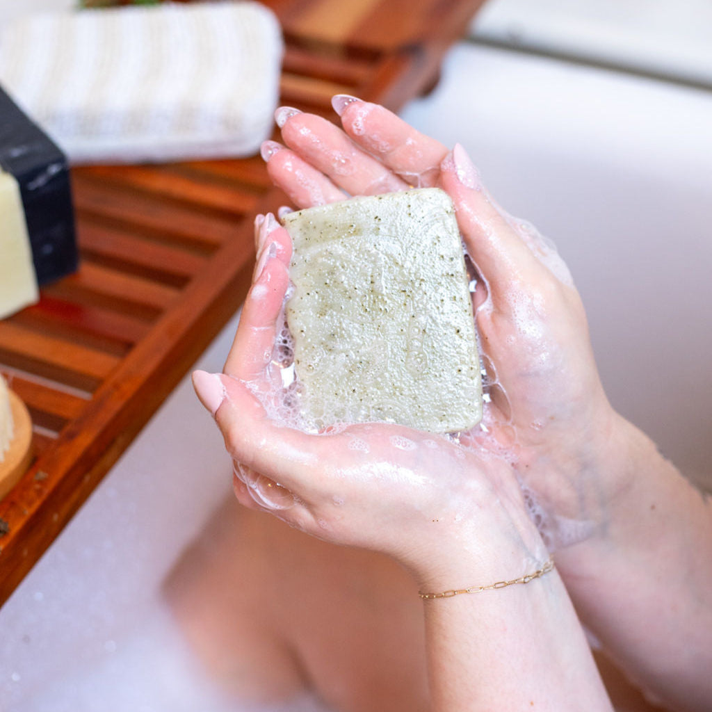 Close-up of Peppermint Soap Bar – natural bar soap with exfoliating mint leaves and tingly peppermint scent with lather