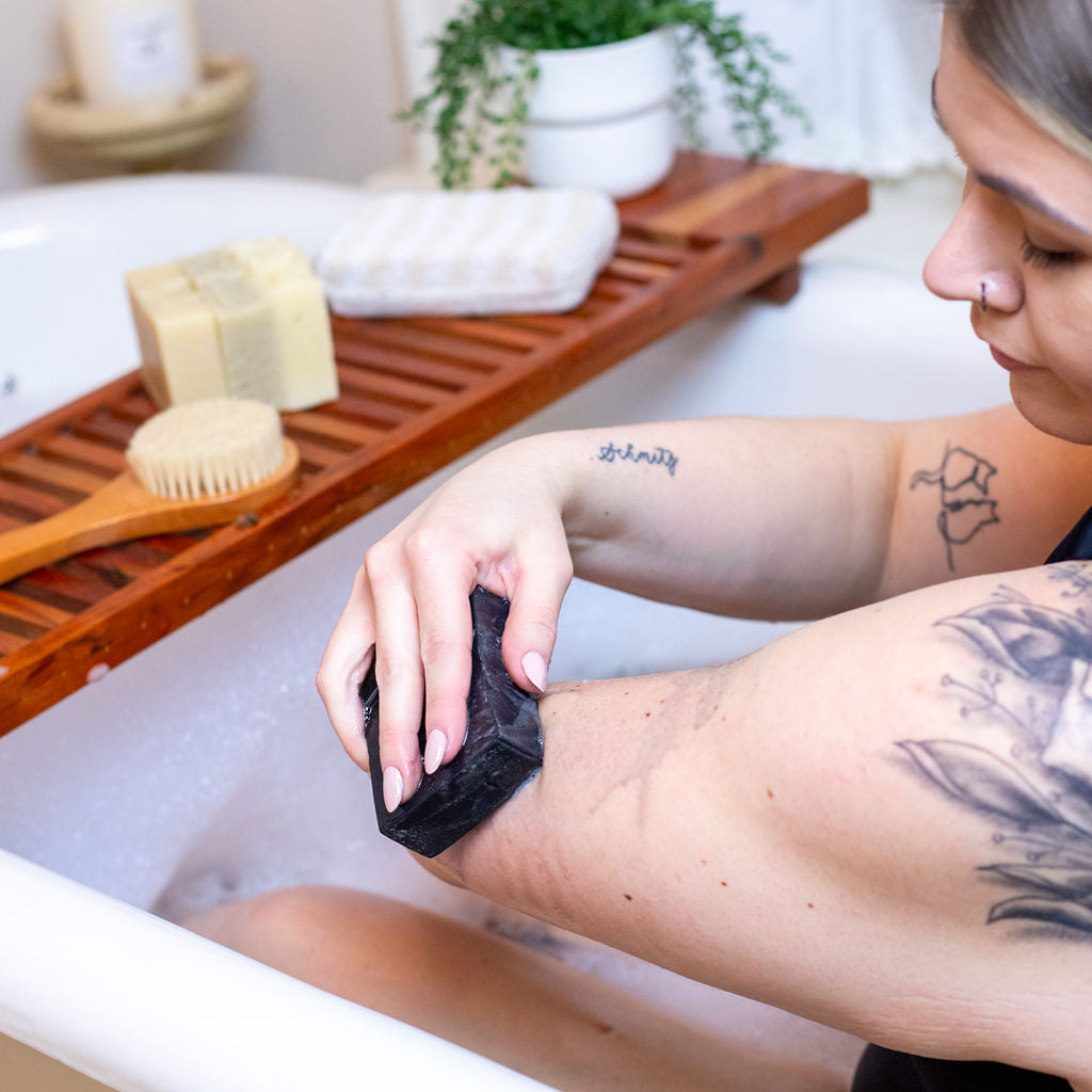 Charcoal & Tea Tree Soap Bar styled in bathroom setting – deep cleansing natural soap made in Minnesota