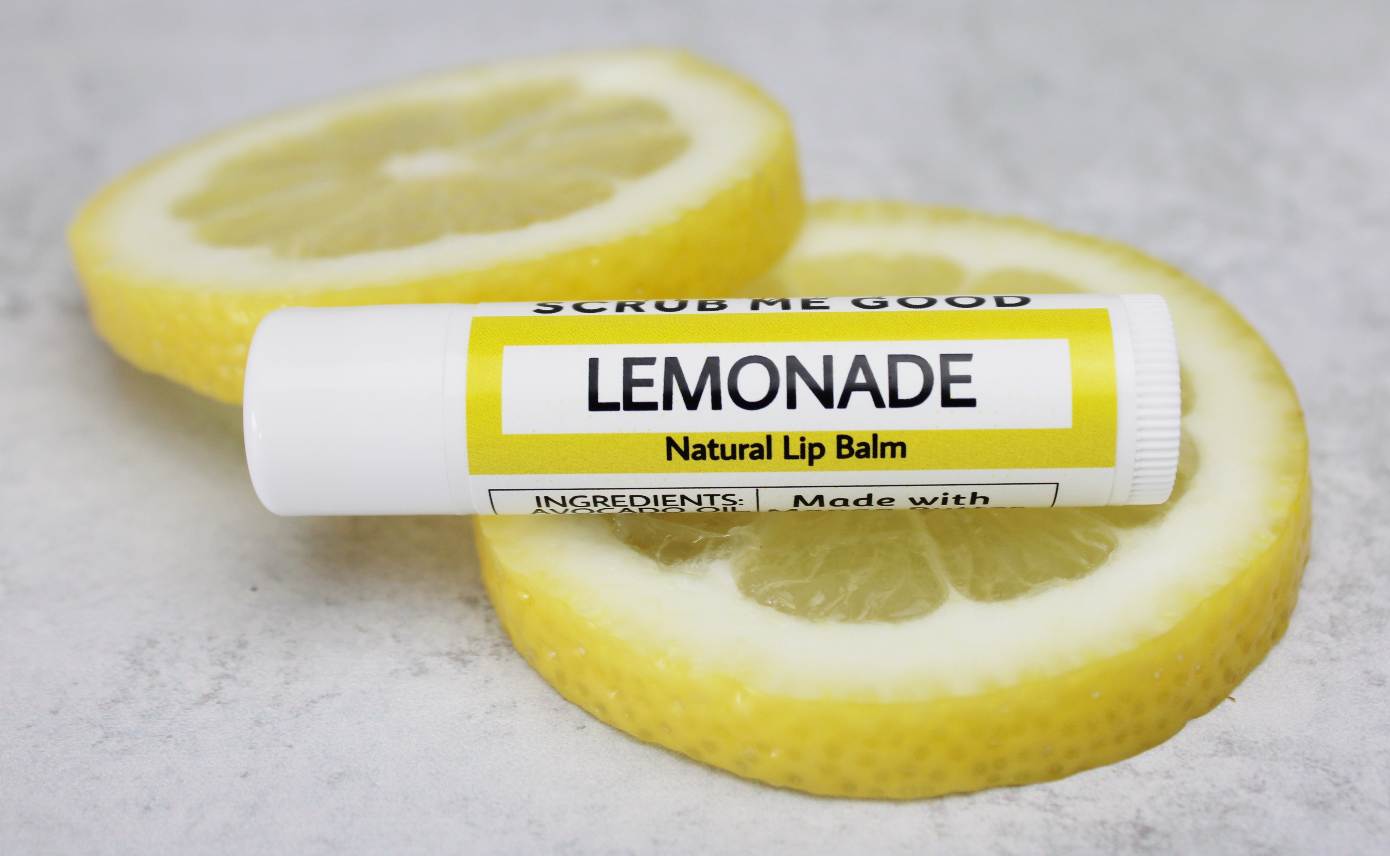lemonade lip balm on lemon slices