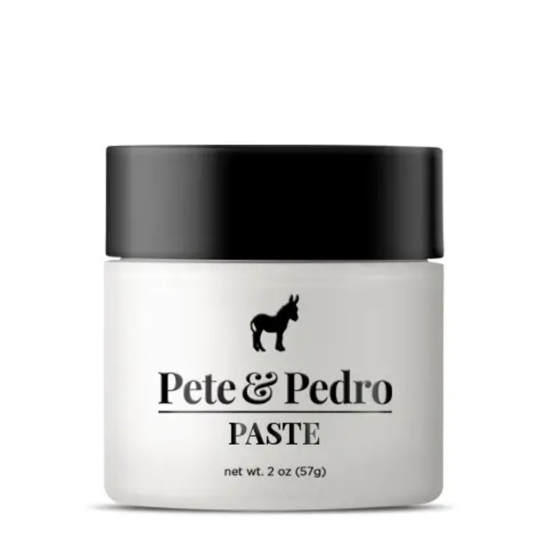 Pete & Pedro hair paste in a 2 oz jar with black lid on a white background