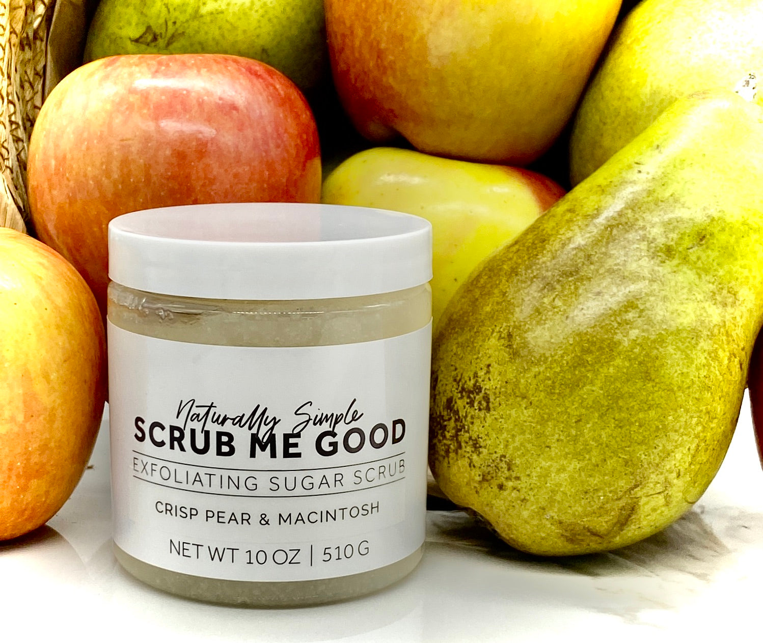 Close-up of Crisp Pear & Macintosh sugar scrub texture in jar