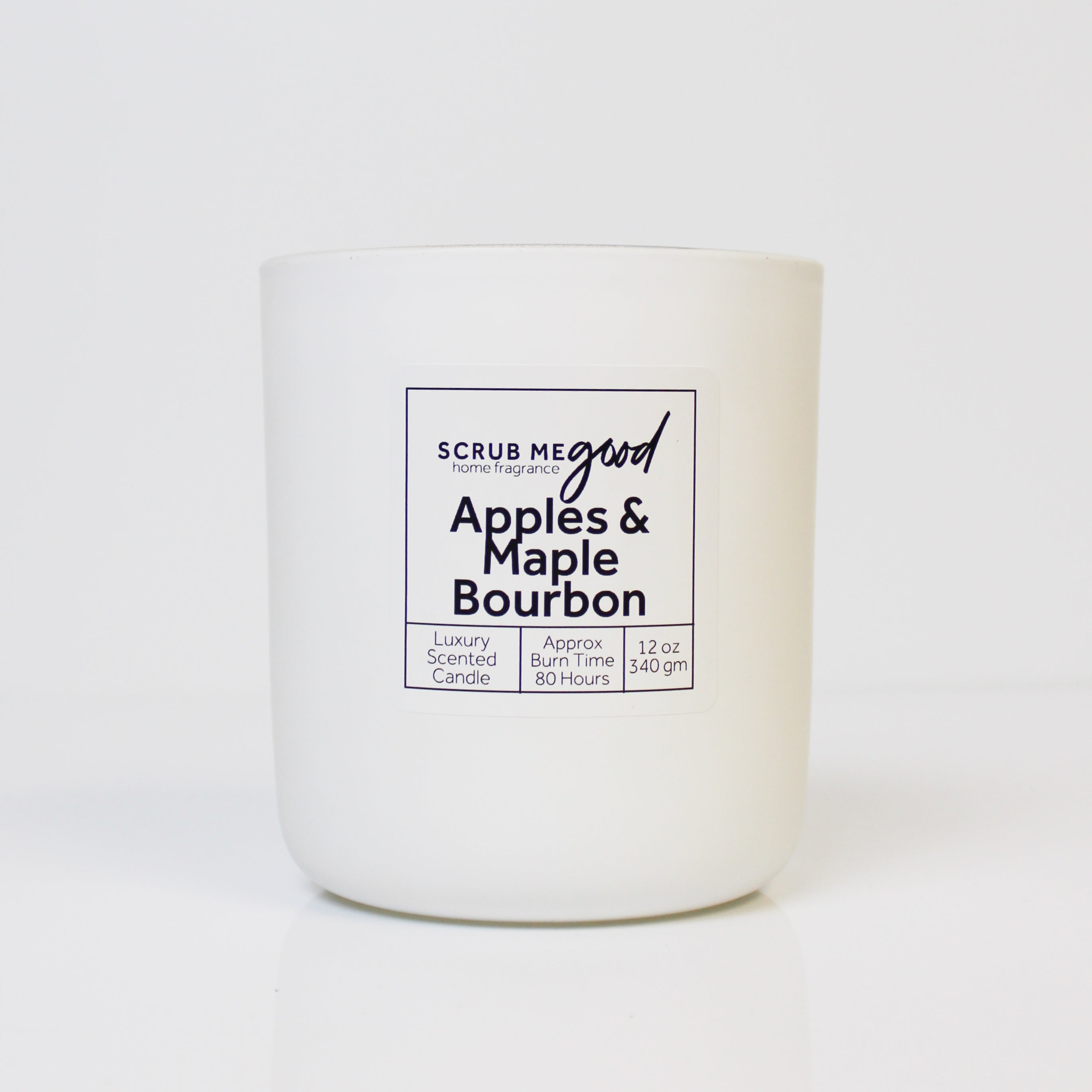 Scrub Me Good Apples & Maple Bourbon 12 oz wooden wick candle with notes of crisp apple and sweet maple.
