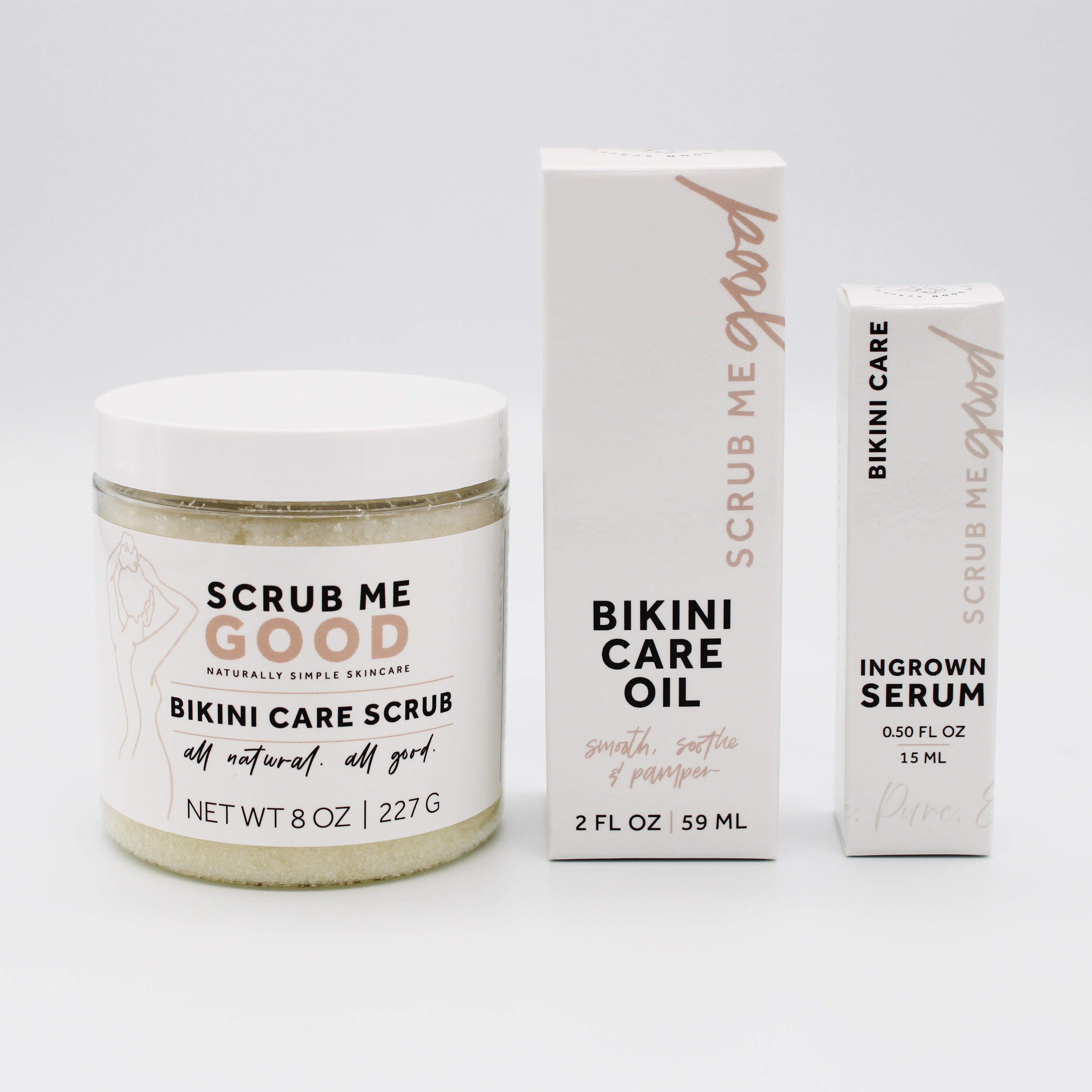 Scrub Me Good skincare products including a scrub, oil, and serum on a white background
