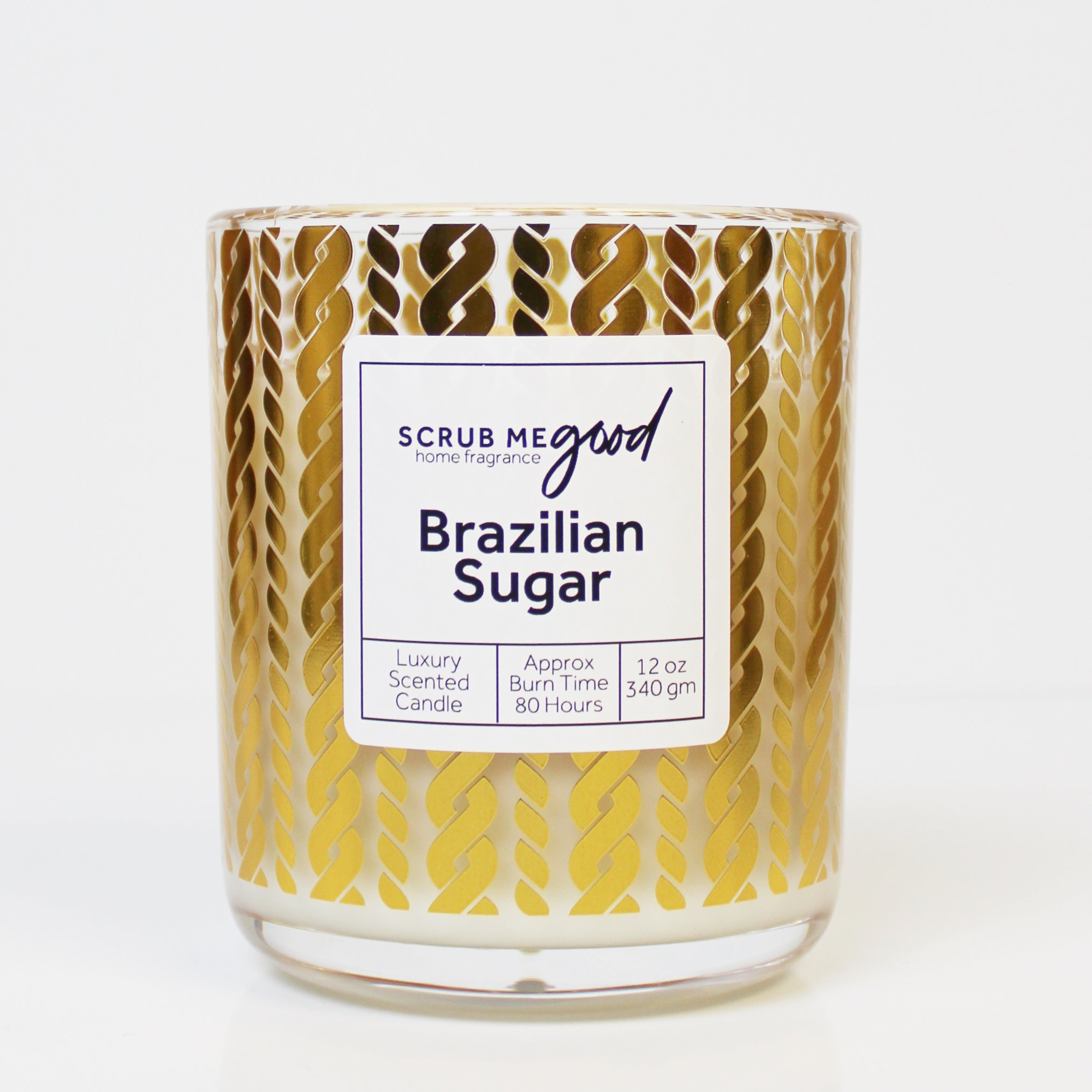 Scrub Me Good Brazilian Sugar 12 oz wooden wick candle with warm caramelized vanilla and macadamia aroma.