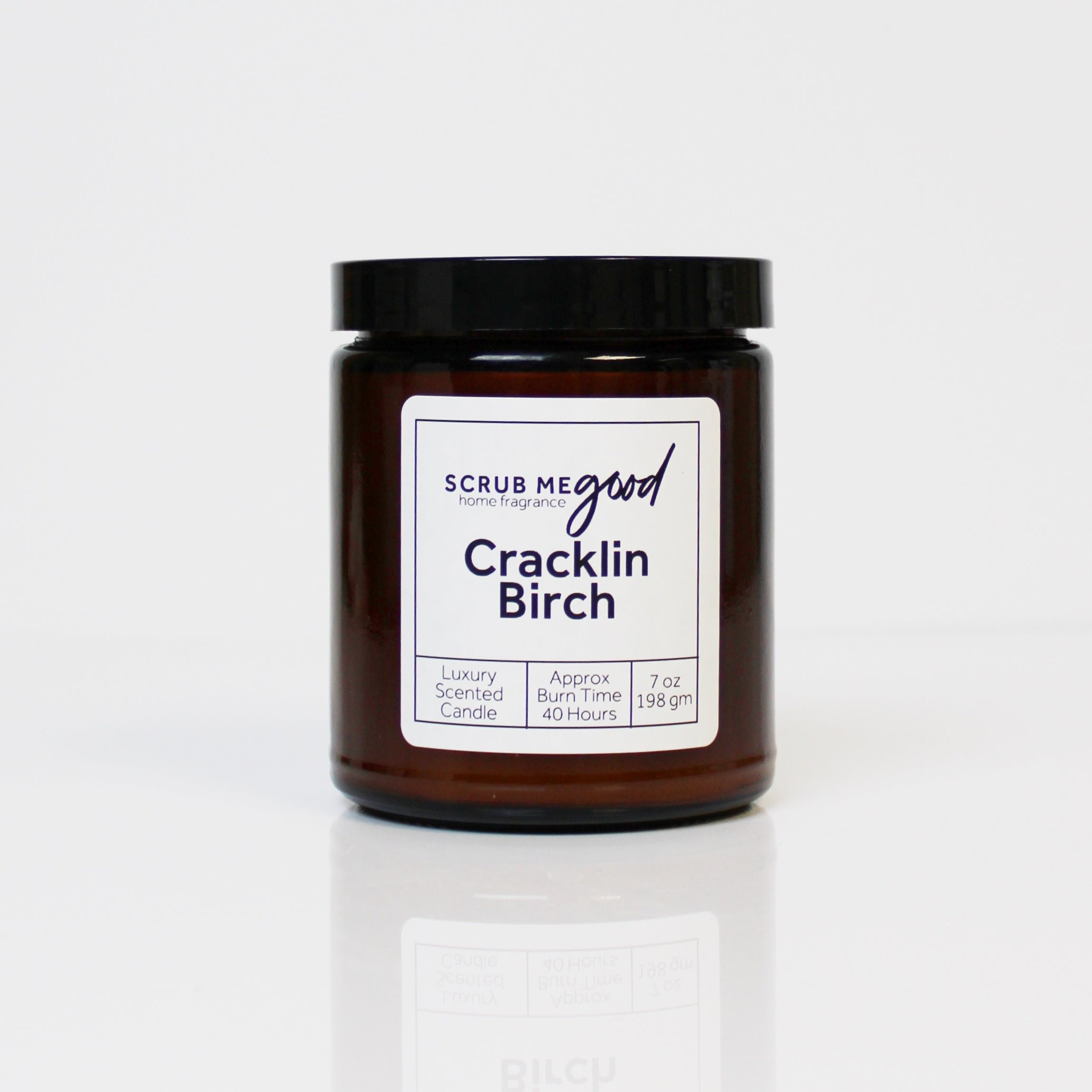 Cracklin Birch 7 oz wooden wick candle by Scrub Me Good in glass jar with crisp woodsy fragrance.