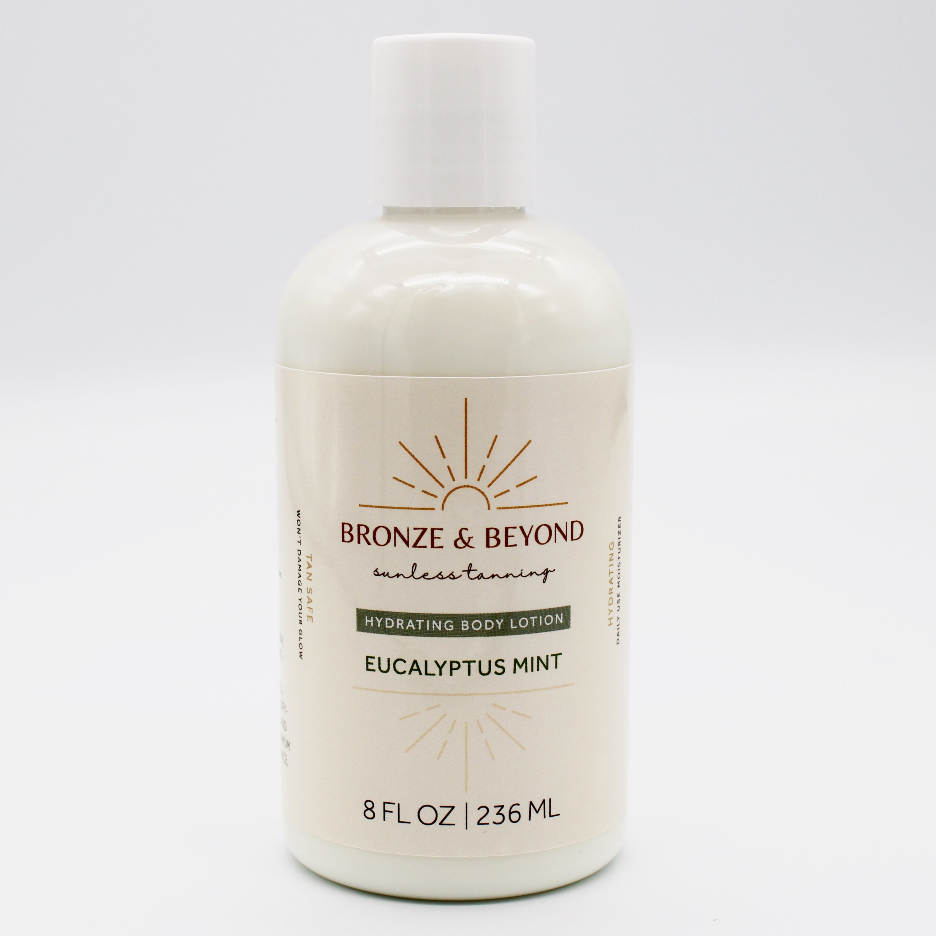 Bottle of Bronze & Beyond eucalyptus mint tan safe body lotion on a white background