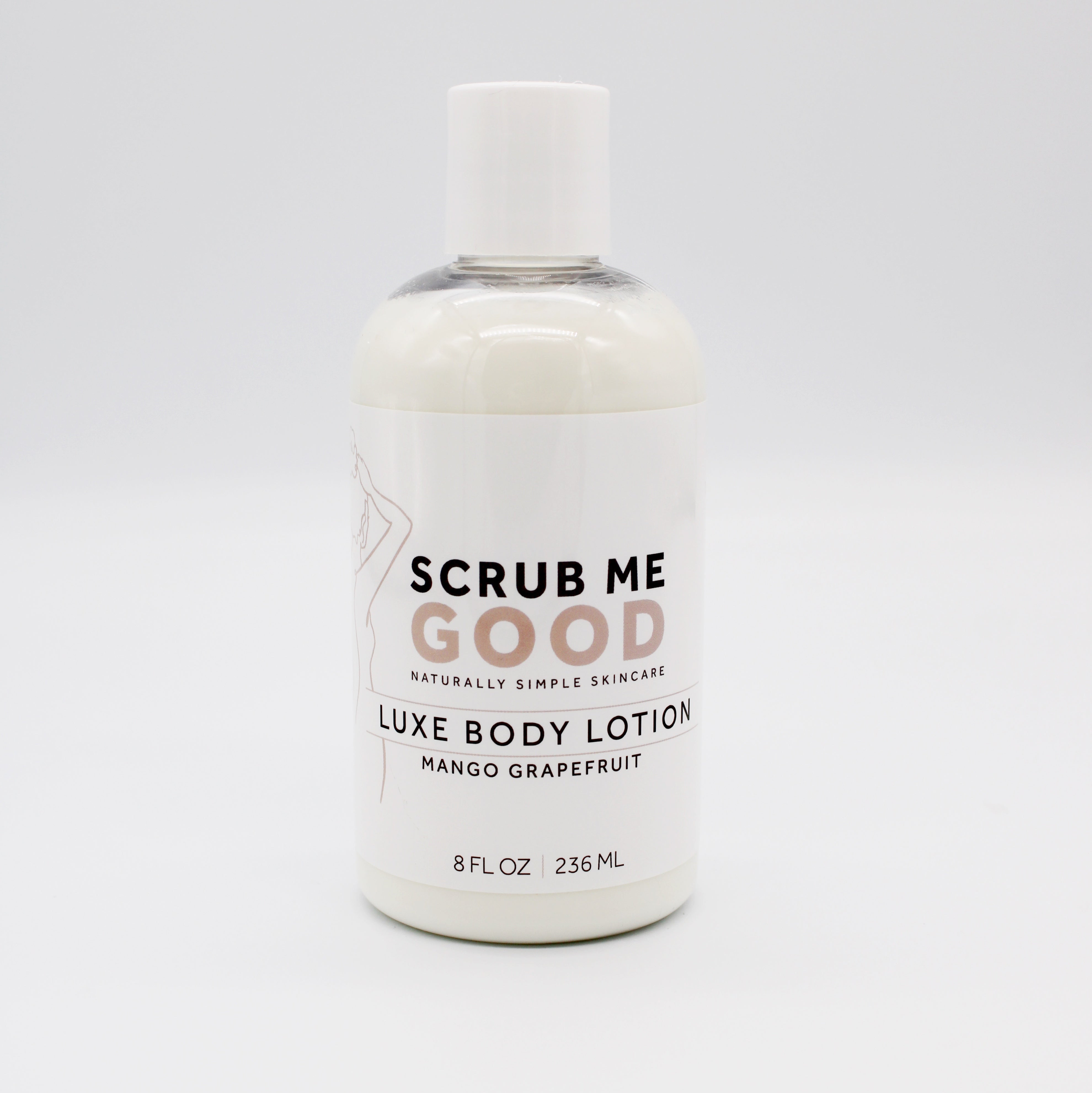 Bottle of Scrub Me Good Mango Grapefruit luxe body lotion on a white background