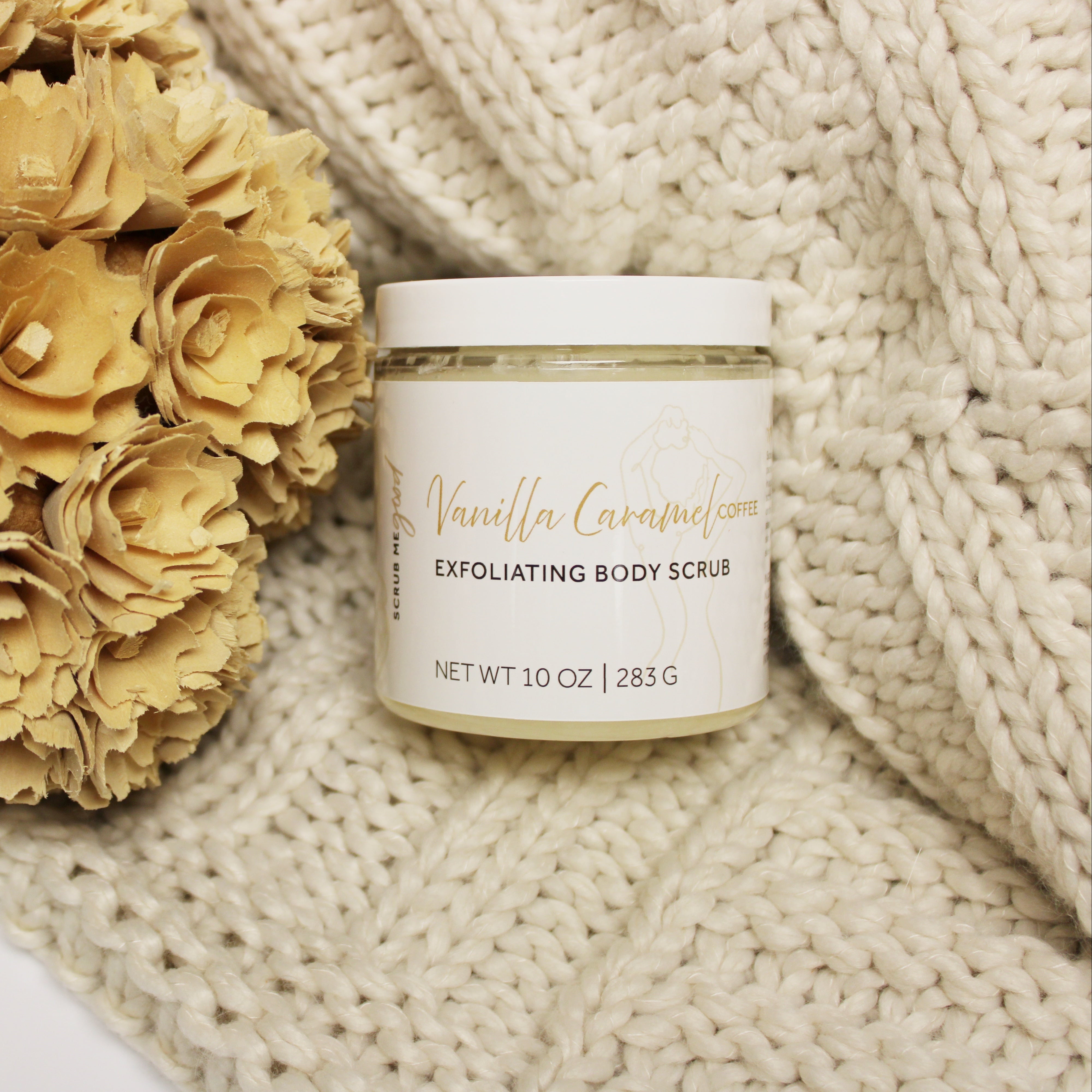 vanilla caramel coffee body scrub by Scrub Me Good on a knit textured blanket